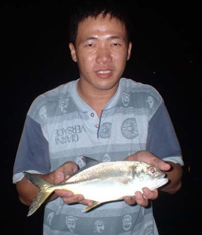 Ron with his Big Eye Travelly caught at night by surfcasting. Rare Catch